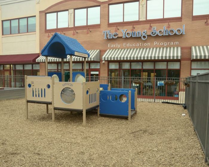school building and playground at Young School